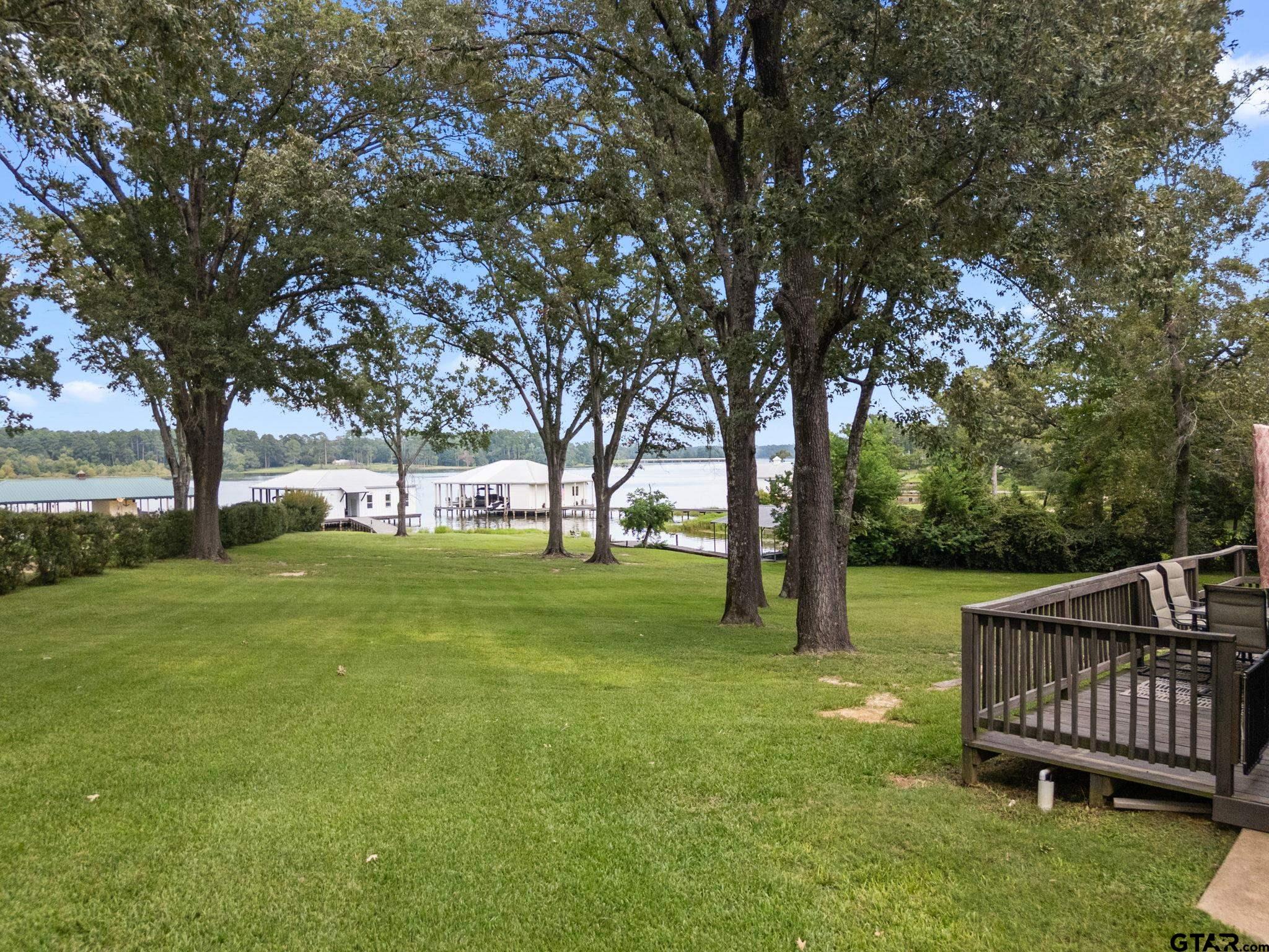 13235 Peninsula Road Whitehouse, TX 75791 - Photo 46 of 48 a view of a garden with trees