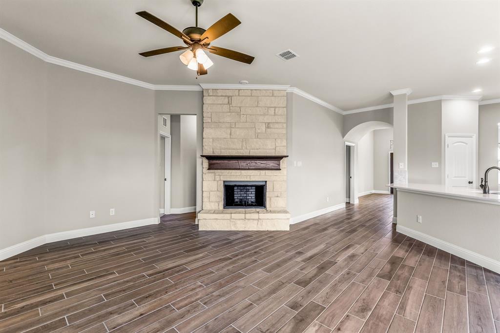 314 Pennington Road Josephine, TX 75173 - Photo 31 of 37 a view of an empty room with a fireplace and a window