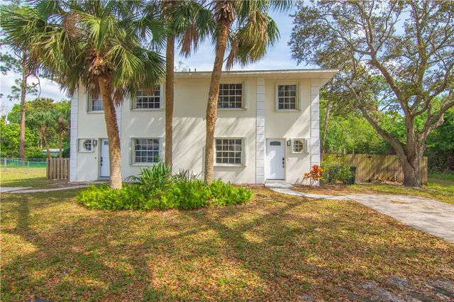 front view of a house with a yard