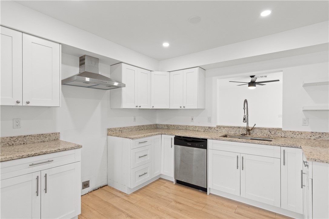 1406-1408 36th Avenue Vero Beach, FL 32960 - Photo 2 of 16 a kitchen with a sink and cabinets
