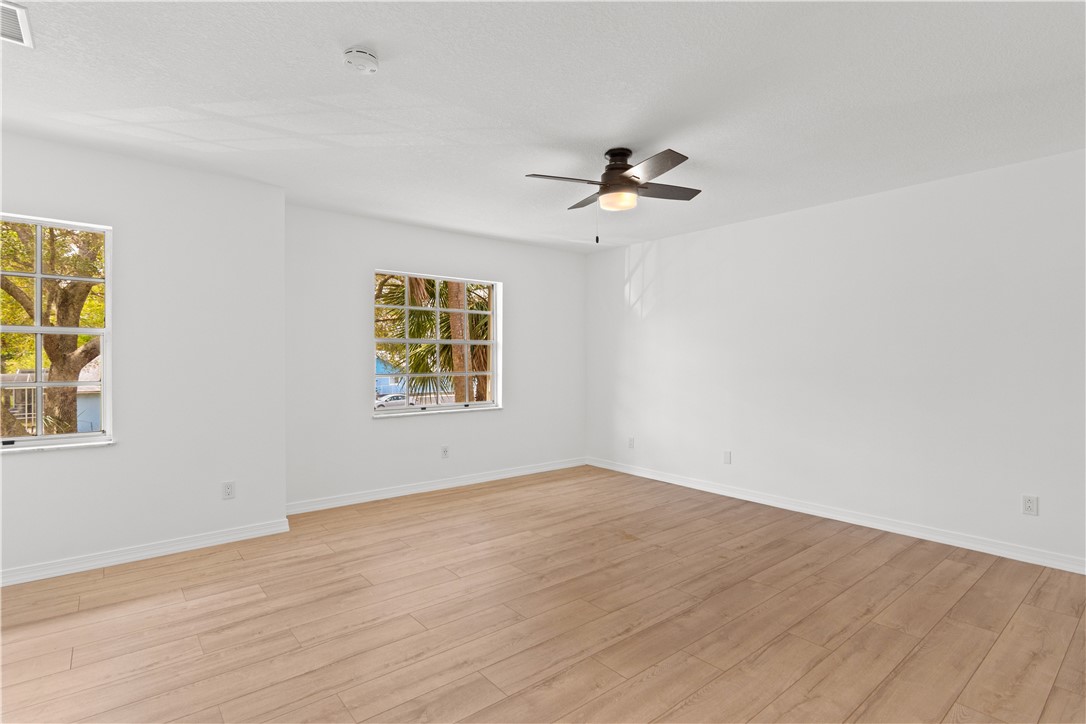 1406-1408 36th Avenue Vero Beach, FL 32960 - Photo 7 of 16 a view of an empty room with a window