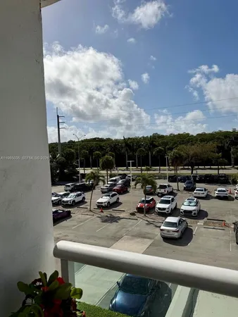 a view of swimming pool and outdoor seating