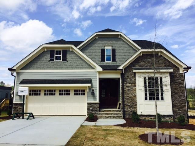 7748 Wilderness Road Raleigh, NC 27613 - Photo 1 of 25 Exterior; Stone will be placed along foundation & front bedroom with house wrap