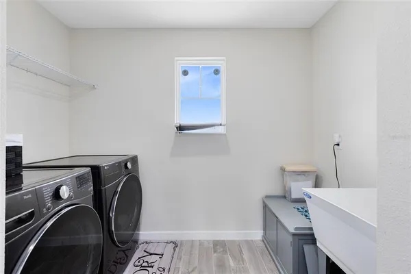 a utility room with dryer and washer