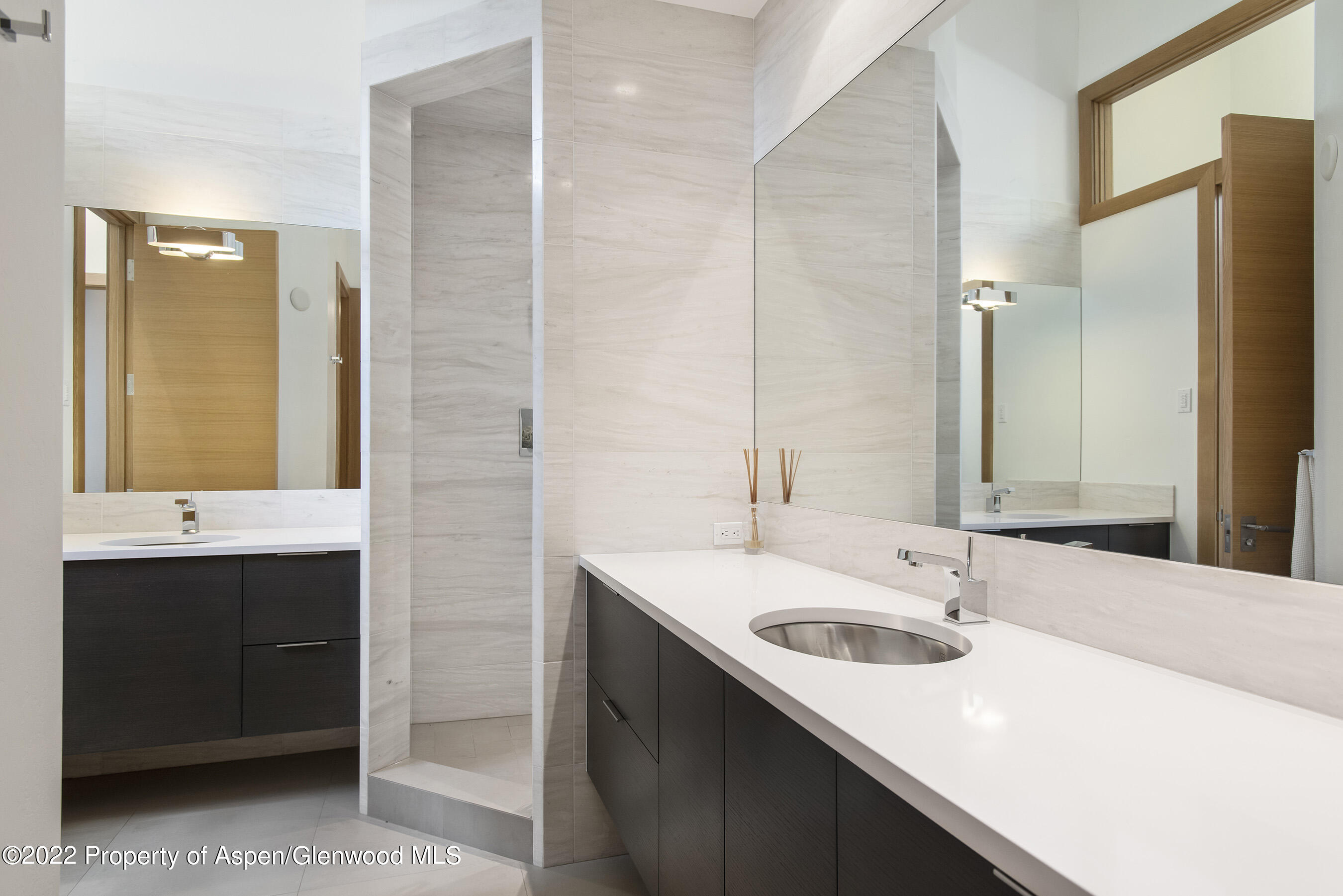 136 Northway Drive Aspen, CO 81611 - Photo 20 of 31 a bathroom with a sink and a mirror