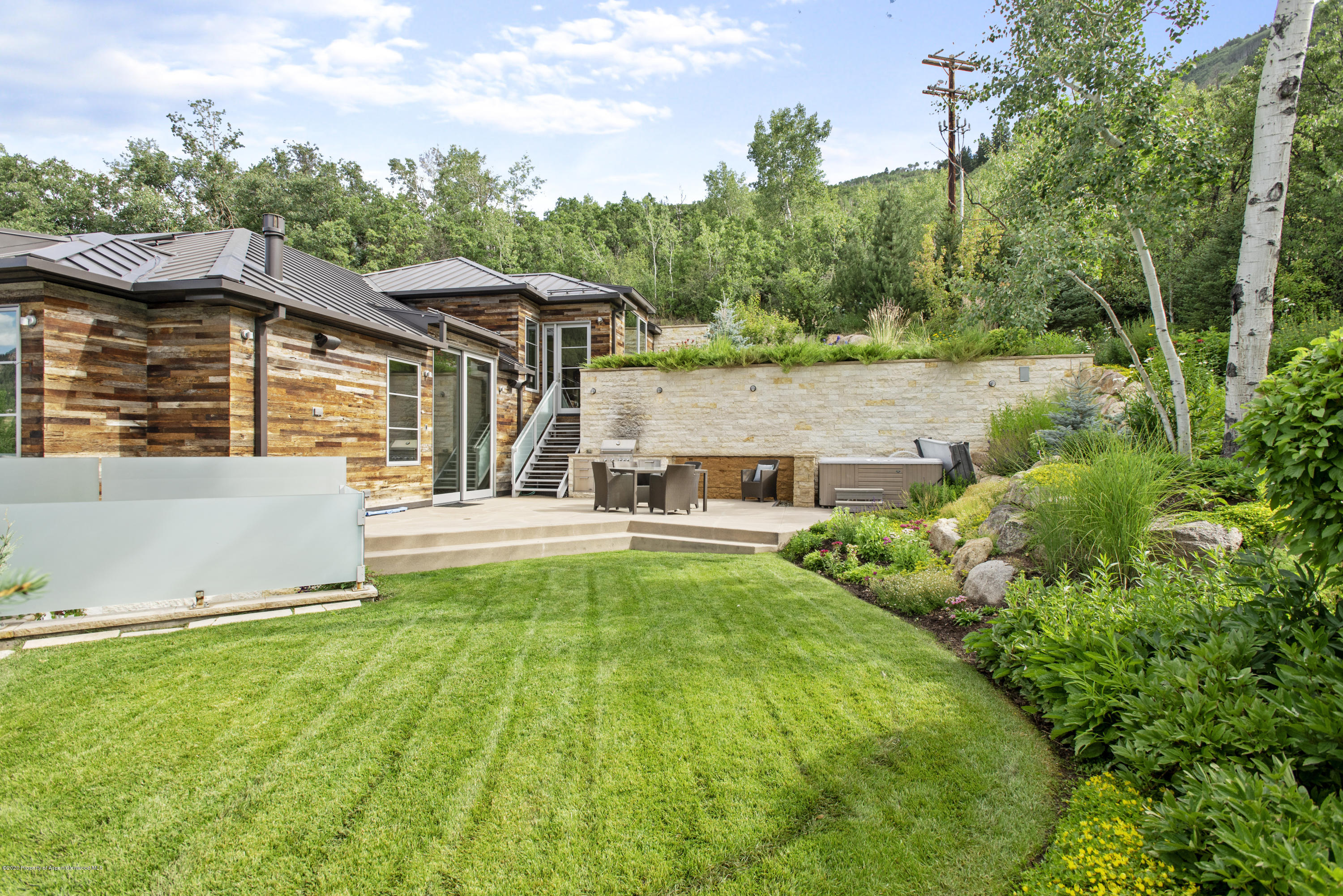 136 Northway Drive Aspen, CO 81611 - Photo 31 of 31 front view of a house with a yard
