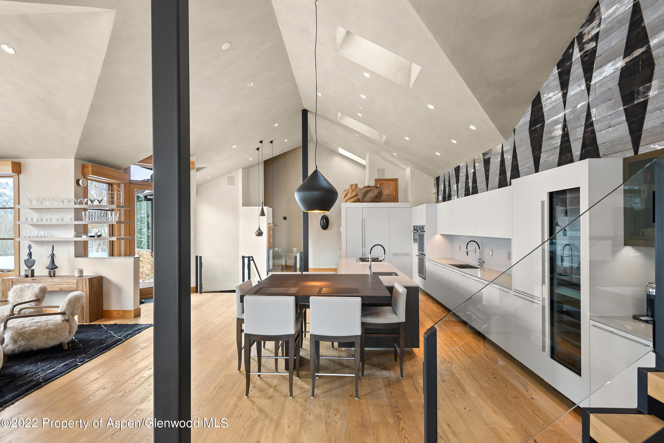 136 Northway Drive Aspen, CO 81611 - Photo 7 of 31 a large kitchen with a table and chairs