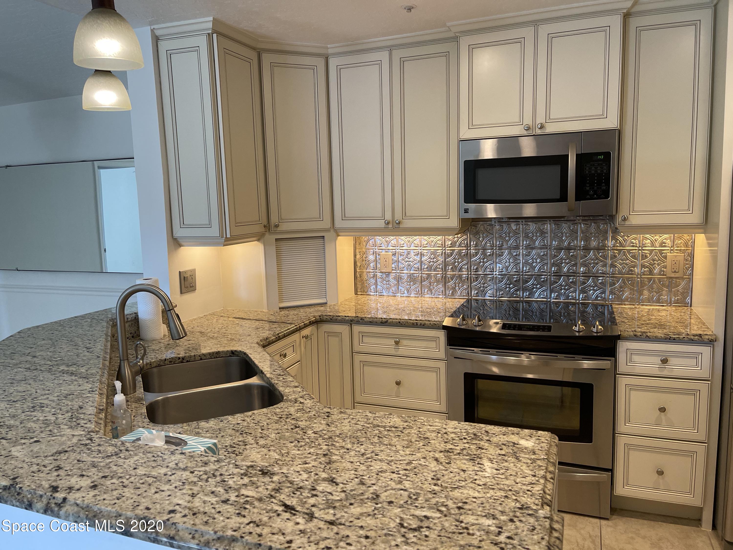7667 North Wickham Road, Unit 918 Melbourne, FL 32940 - Photo 2 of 23 2nVW+DC8T9ueXxprD3MoFQ