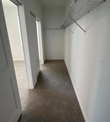 a view of a back yard from a balcony