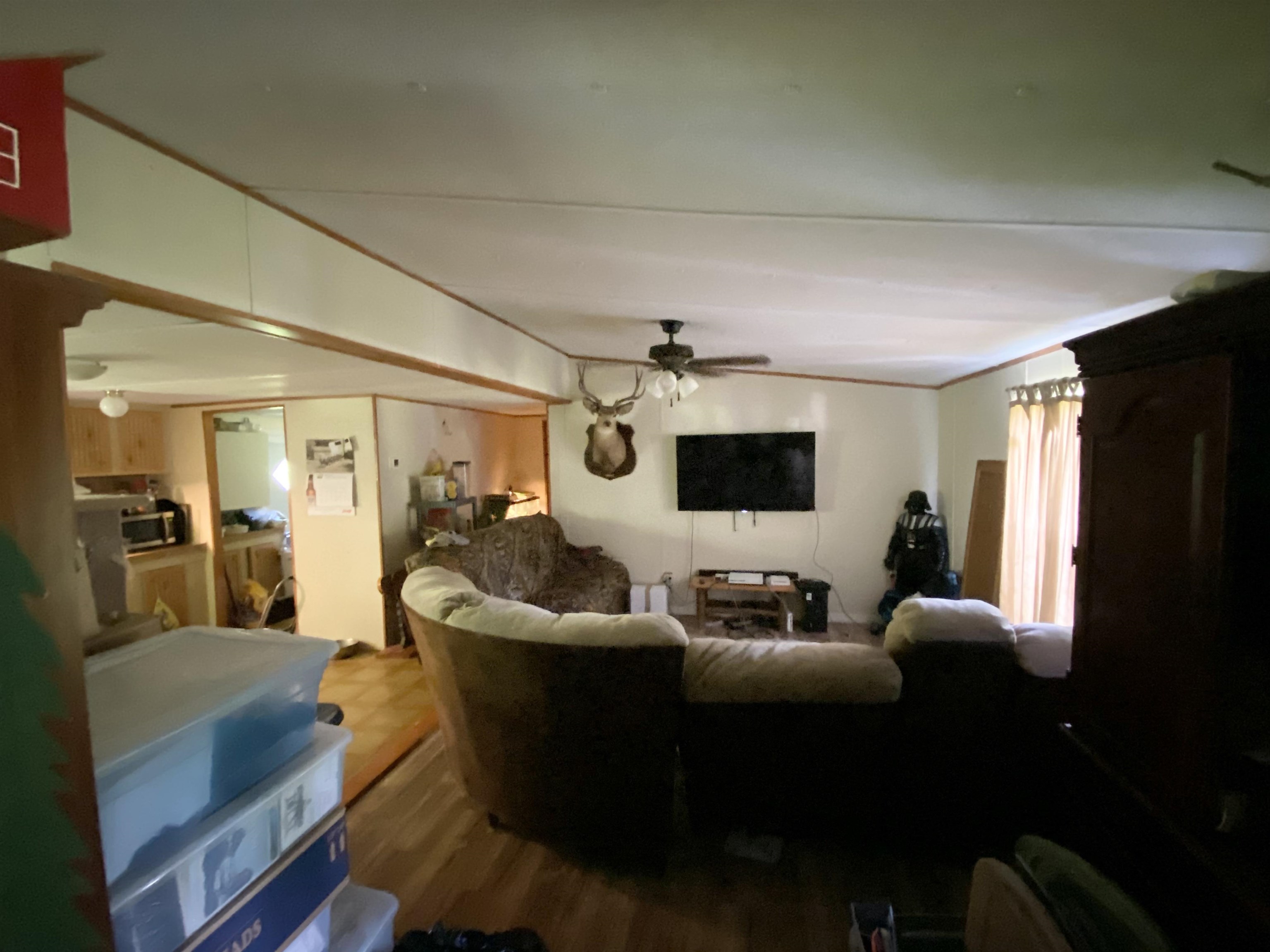 2829 Green Acres Rd Extension St. Augustine, FL 32084 - Photo 7 of 10 a living room with furniture and a flat screen tv