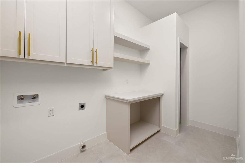 200 Micaela Road, Unit SERVICE Penitas, TX 78576 - Photo 16 of 30 a utility room with dryer and washer