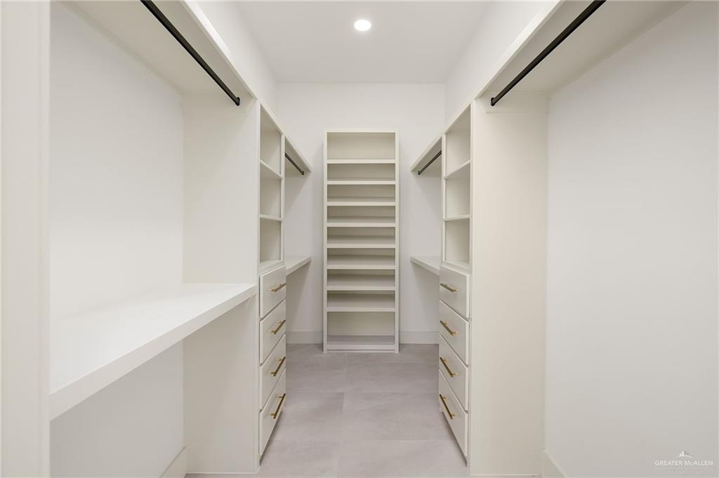 200 Micaela Road, Unit SERVICE Penitas, TX 78576 - Photo 24 of 30 a view of walk in closet with empty racks
