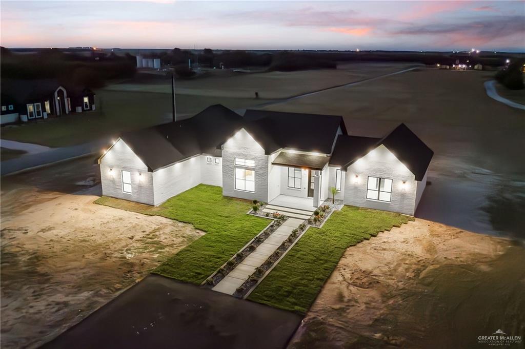 200 Micaela Road, Unit SERVICE Penitas, TX 78576 - Photo 3 of 30 a view of a backyard with pathway