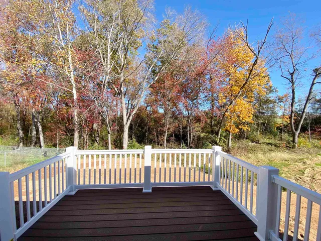 a view of a wooden roof deck