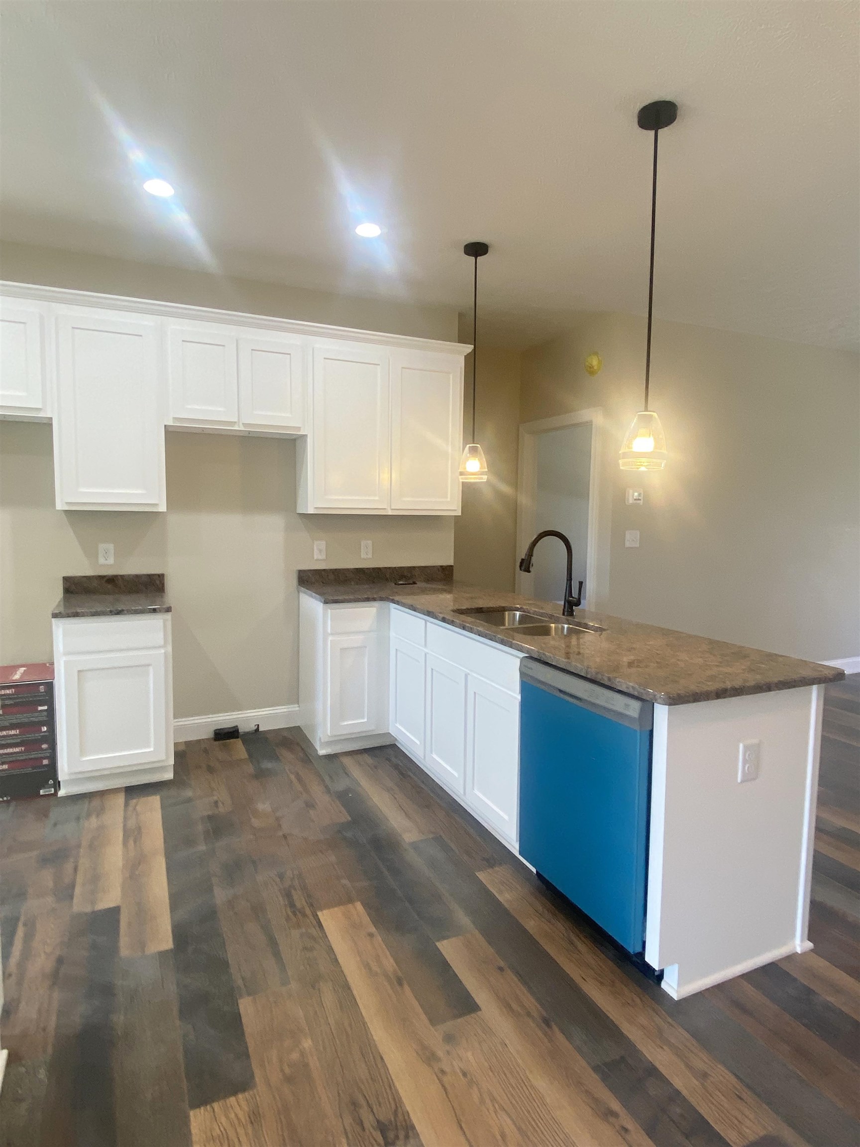 117 Spring Ridge Drive Stuarts Draft, VA 24477 - Photo 3 of 12 a kitchen with stainless steel appliances granite countertop a sink a stove and a wooden floors