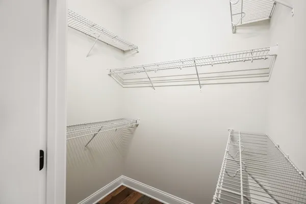 a view of a room with racks on the wall
