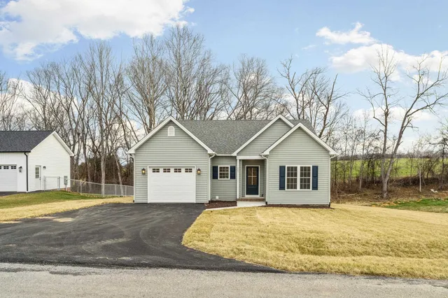 a view of a house with a white door