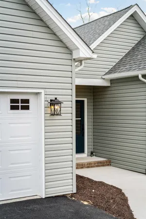 a view of a house with a white door