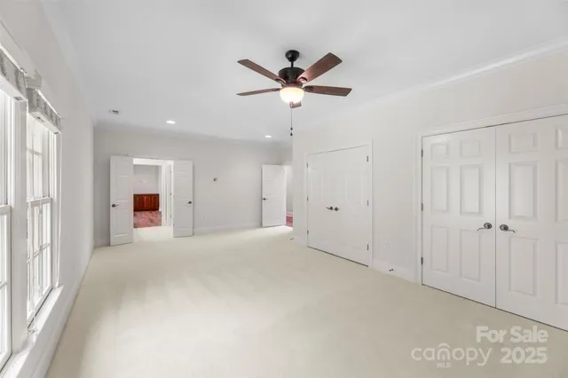 a kitchen with granite countertop a refrigerator and a sink