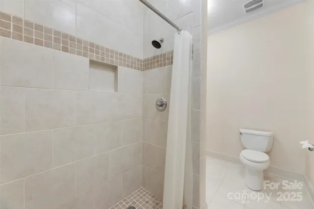 a view of a balcony with wooden floor