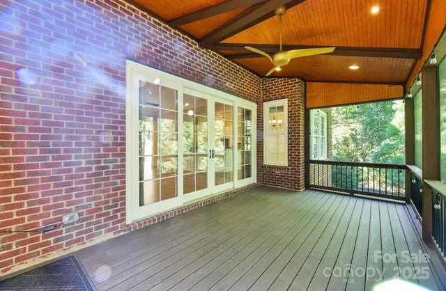 a view of outdoor space with wooden fence