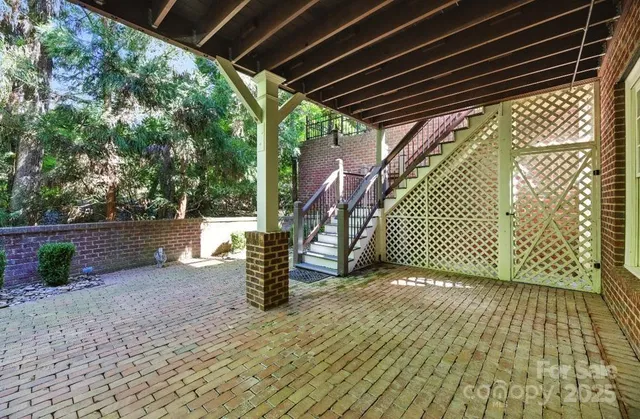 front view of a house with a large window