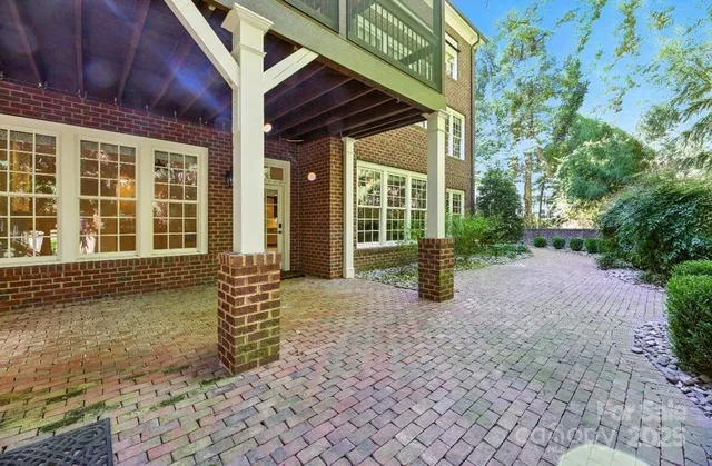 a view of a swimming pool with a patio