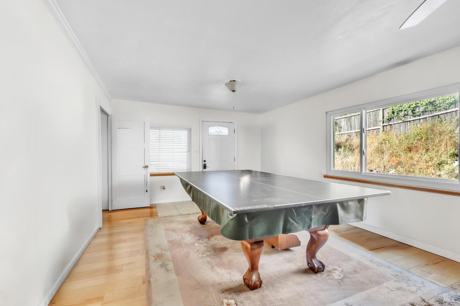 1138 Lokoya Road Napa, CA 94558 - Photo 25 of 35 a room with table and window