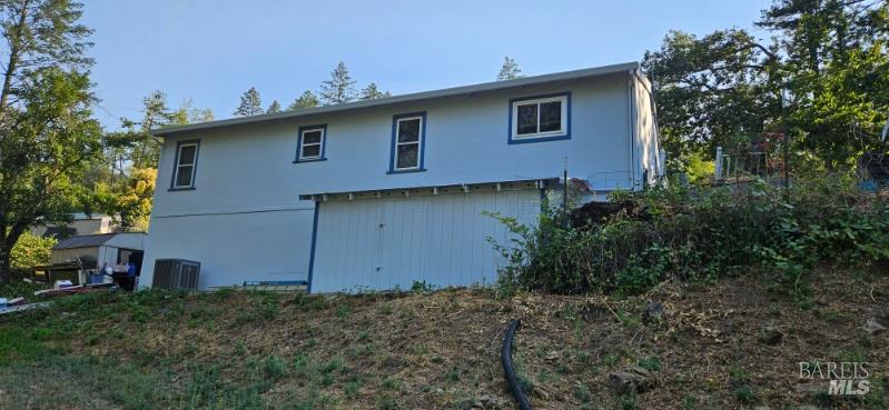 1138 Lokoya Road Napa, CA 94558 - Photo 7 of 28 a front view of a house with garden