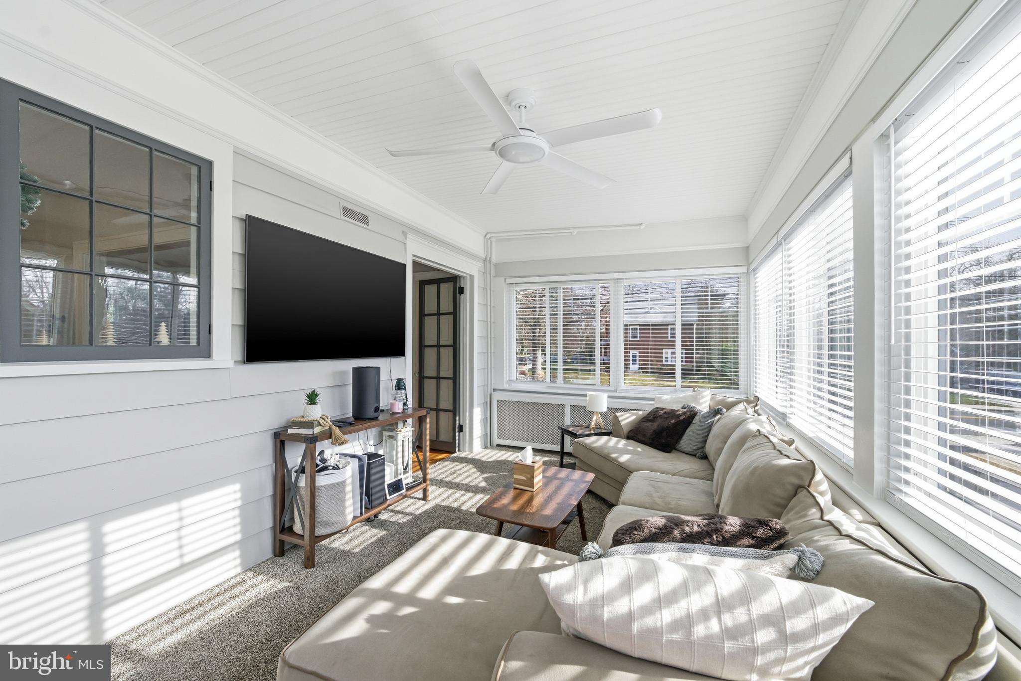 612 Grove Street Haddonfield, NJ 08033 - Photo 16 of 64 a living room with furniture and a flat screen tv