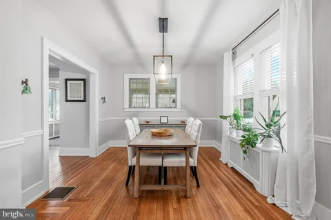 a view of a livingroom with furniture and a fireplace