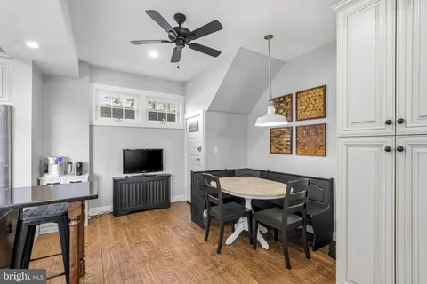 a view of a livingroom with furniture and a dining room