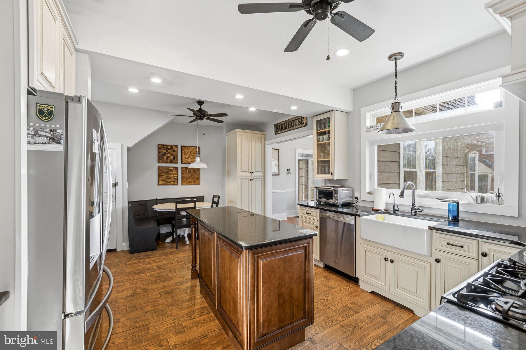 612 Grove Street Haddonfield, NJ 08033 - Photo 27 of 64 a kitchen with stainless steel appliances granite countertop a sink stove and refrigerator