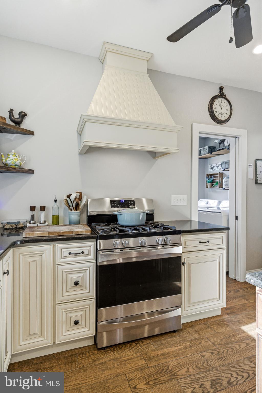 612 Grove Street Haddonfield, NJ 08033 - Photo 28 of 64 a kitchen with stainless steel appliances granite countertop a stove and white cabinets