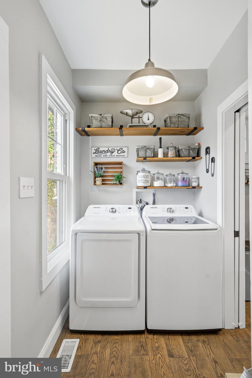 612 Grove Street Haddonfield, NJ 08033 - Photo 29 of 64 a view of washer and dryer with kitchen in the background