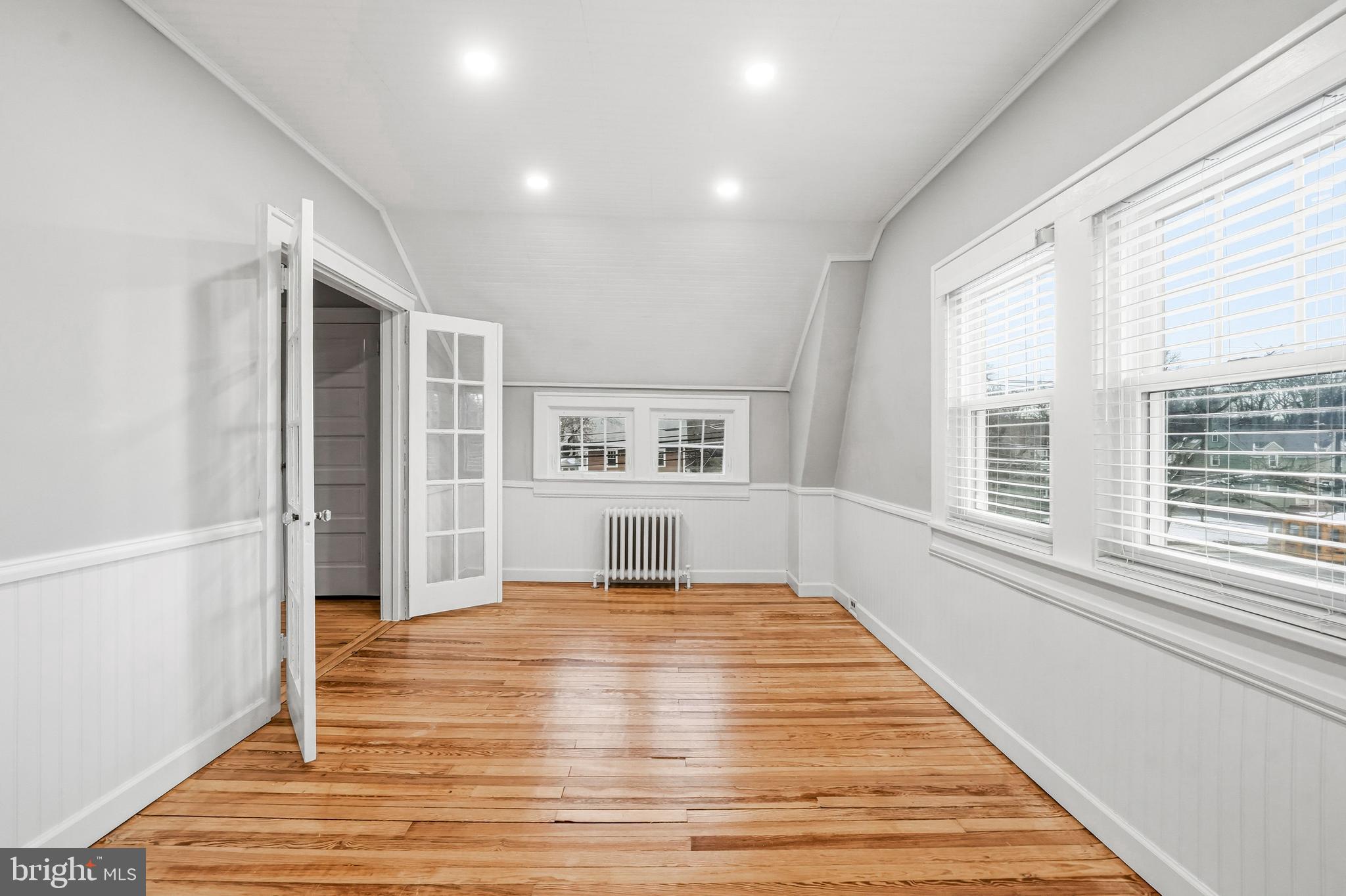 612 Grove Street Haddonfield, NJ 08033 - Photo 36 of 64 a view of empty room with wooden floor and fan