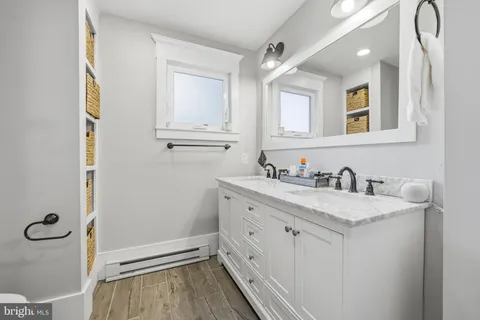 an aerial view of a house with a swimming pool