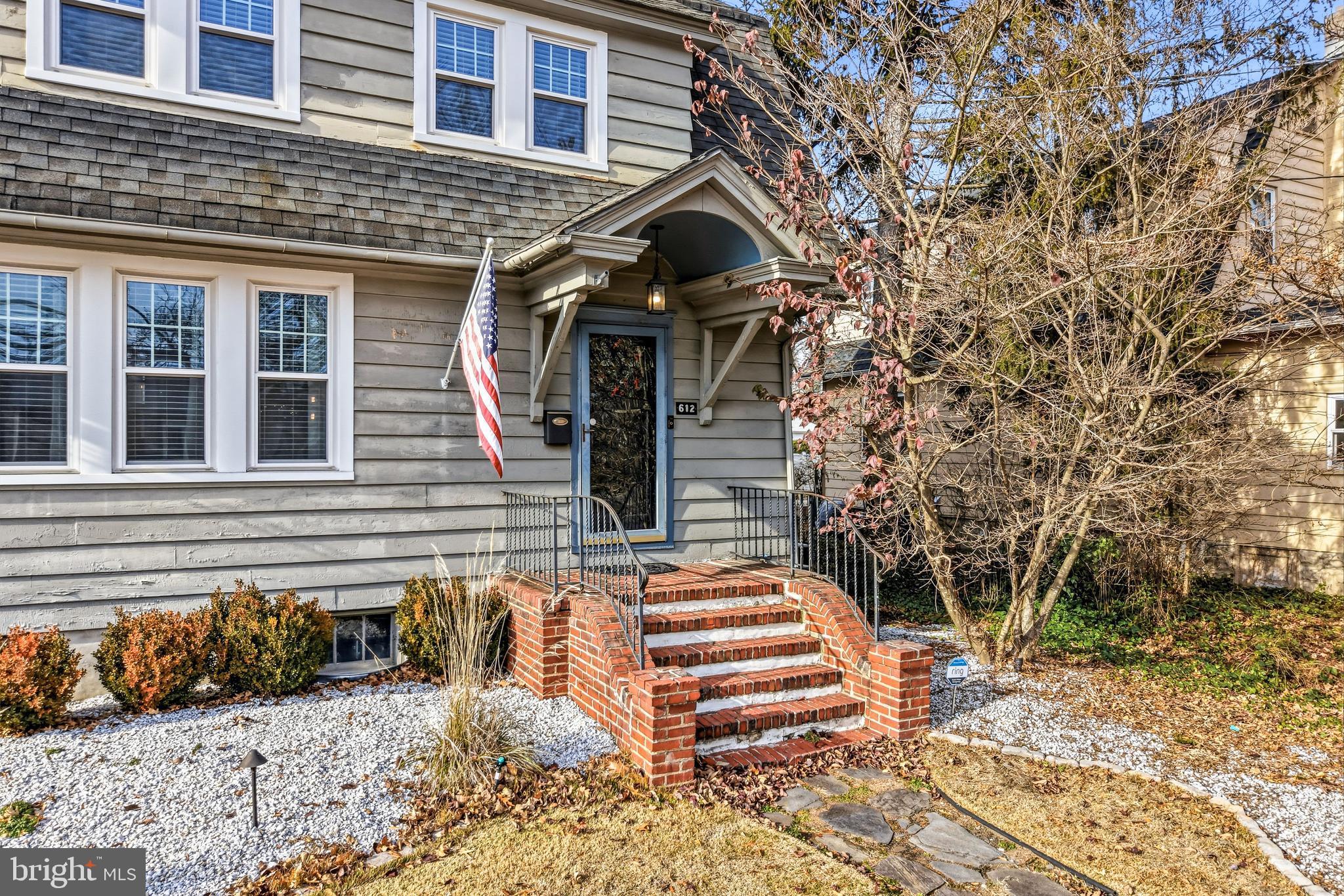 612 Grove Street Haddonfield, NJ 08033 - Photo 5 of 64 a front view of a house with a yard