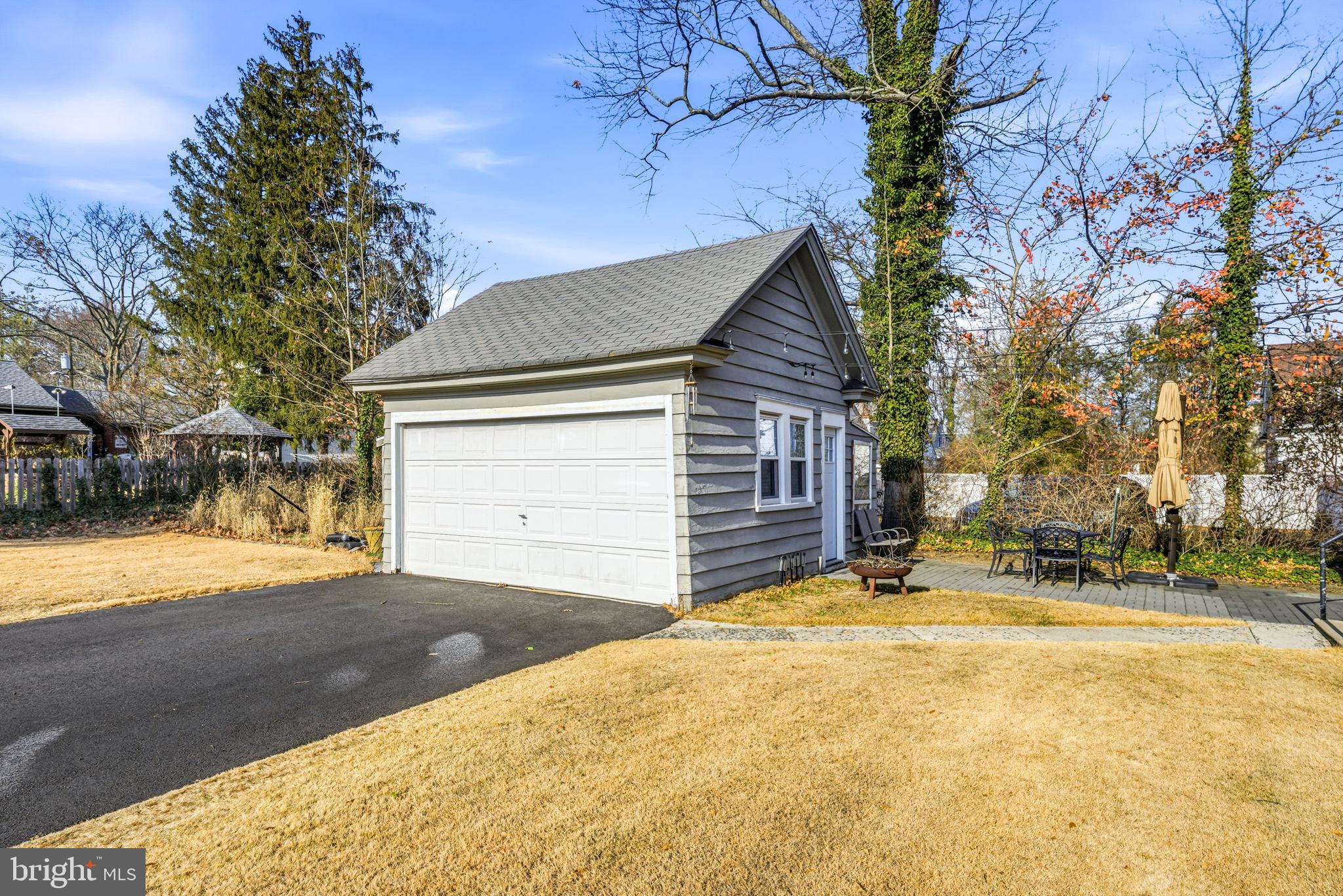 612 Grove Street Haddonfield, NJ 08033 - Photo 58 of 64 a backyard of a house with large trees