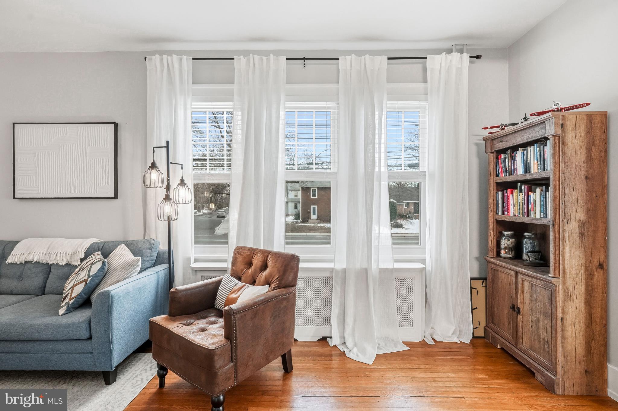 612 Grove Street Haddonfield, NJ 08033 - Photo 10 of 64 a living room with furniture and a book shelf
