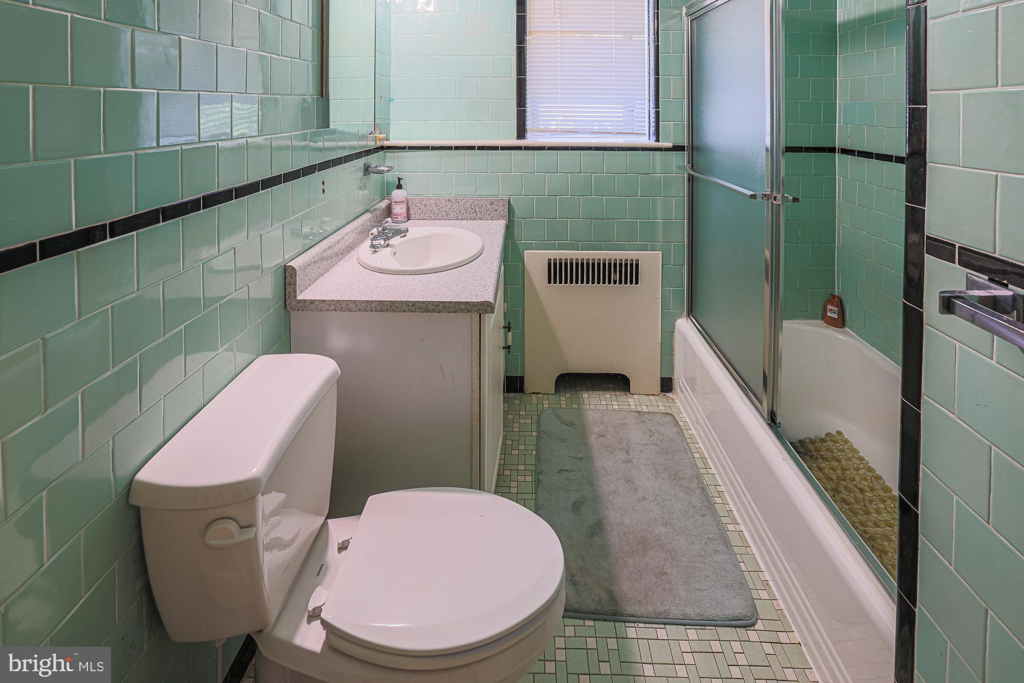 3305 Bancroft Road Baltimore, MD 21215 - Photo 54 of 61 Vintage charm in a mint green bath.