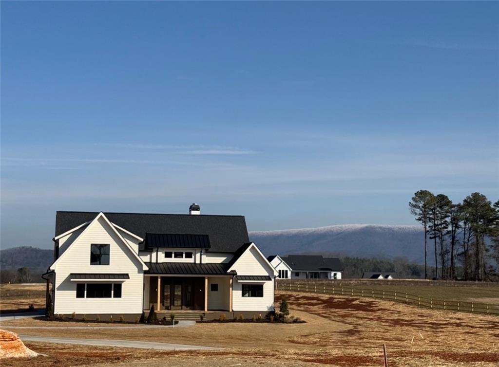 120 Palisade Drive Rydal, GA 30171 - Photo 8 of 11 a front view of a house with a yard