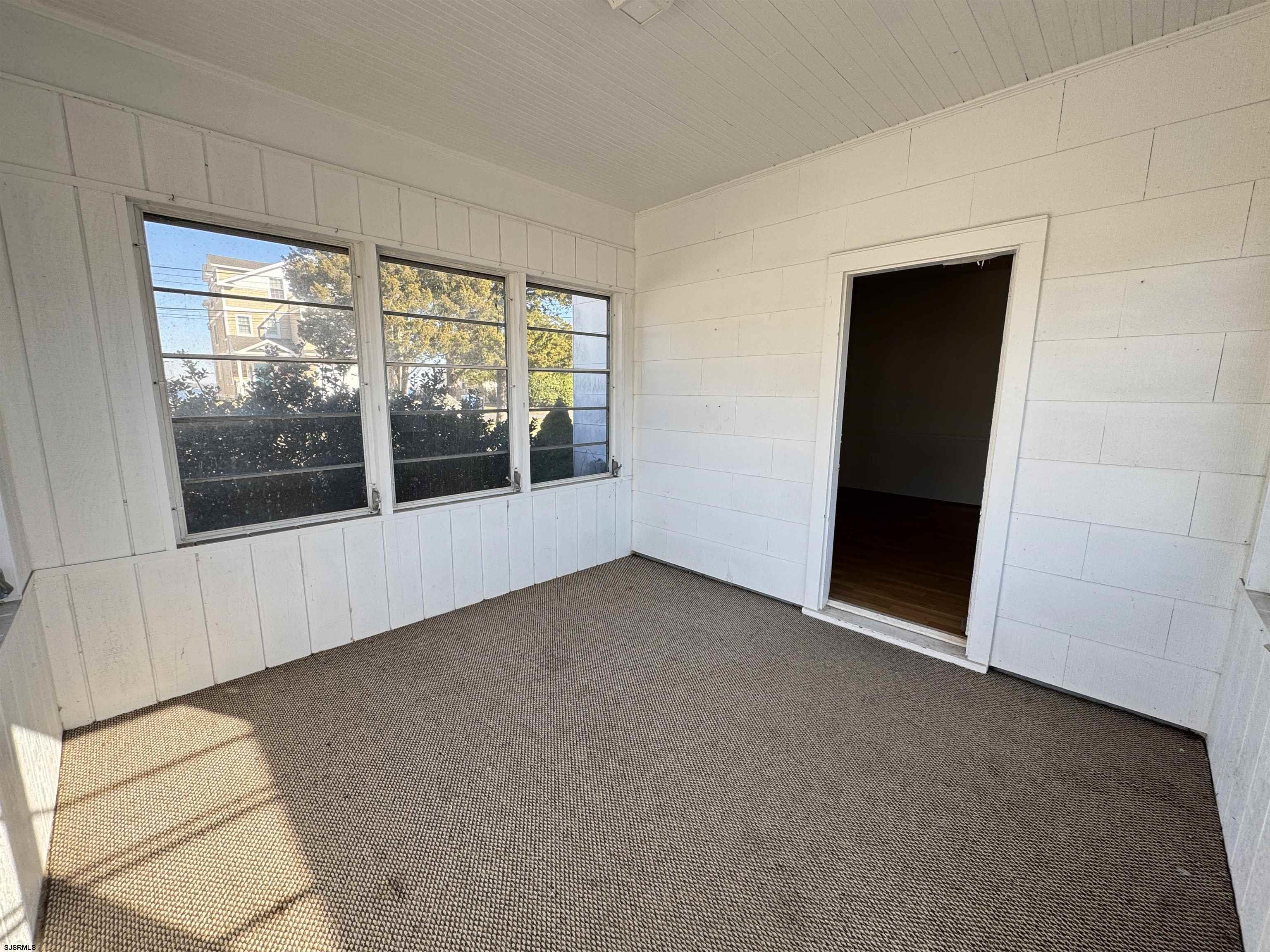 106 Harbor Road Marmora, NJ 08223 - Photo 10 of 11 a view of an empty room with a window