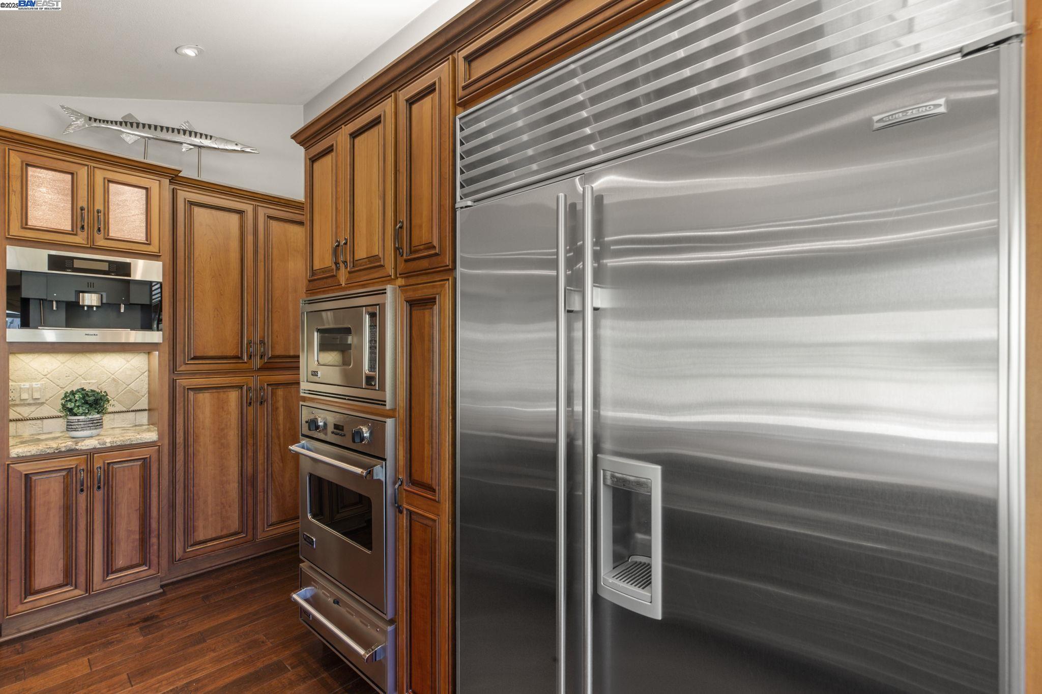 820 Pinehurst Place San Ramon, CA 94583 - Photo 16 of 54 a kitchen with cabinets and stainless steel appliances