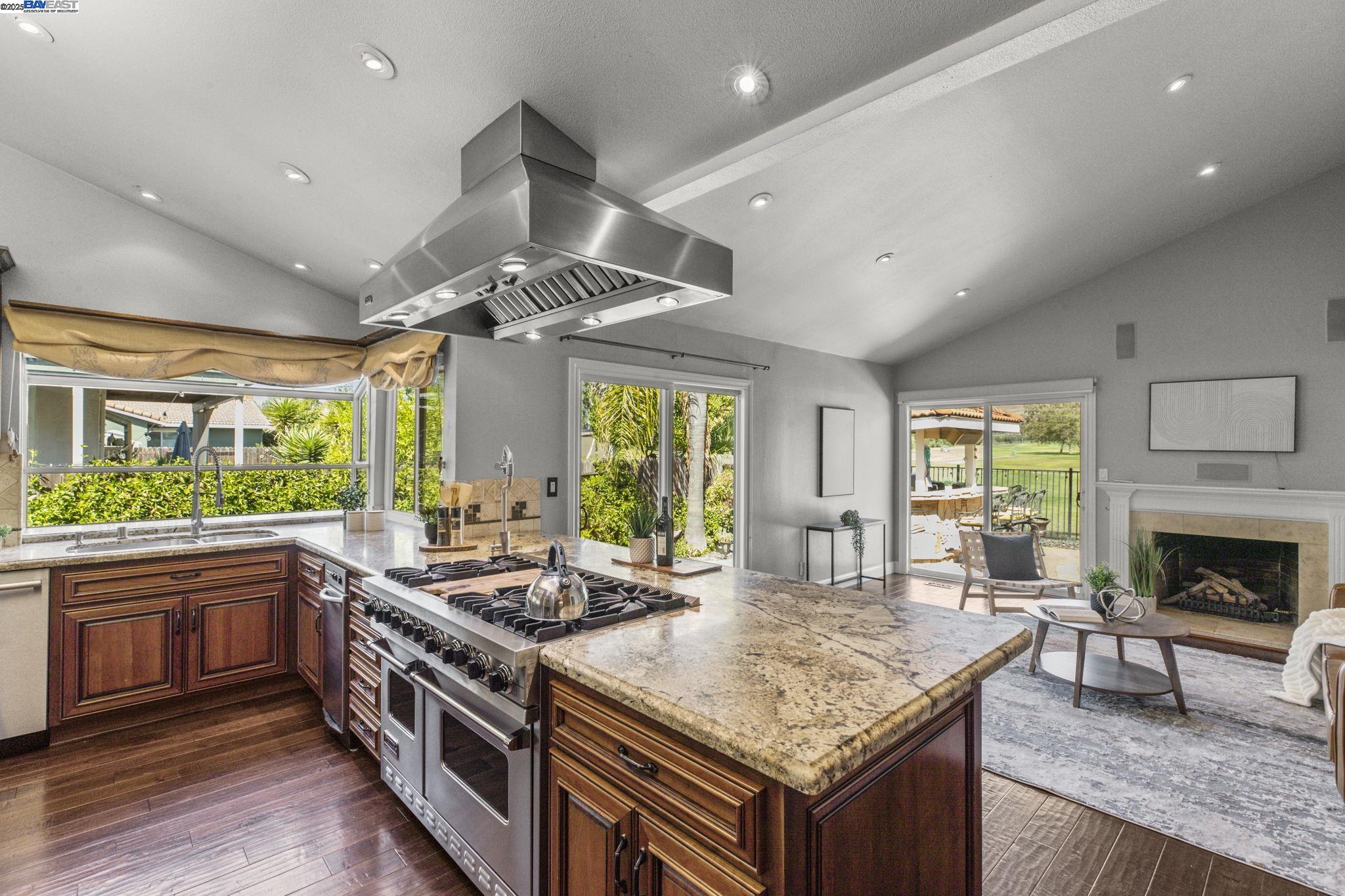 820 Pinehurst Place San Ramon, CA 94583 - Photo 19 of 54 a kitchen with stainless steel appliances granite countertop a stove and a refrigerator