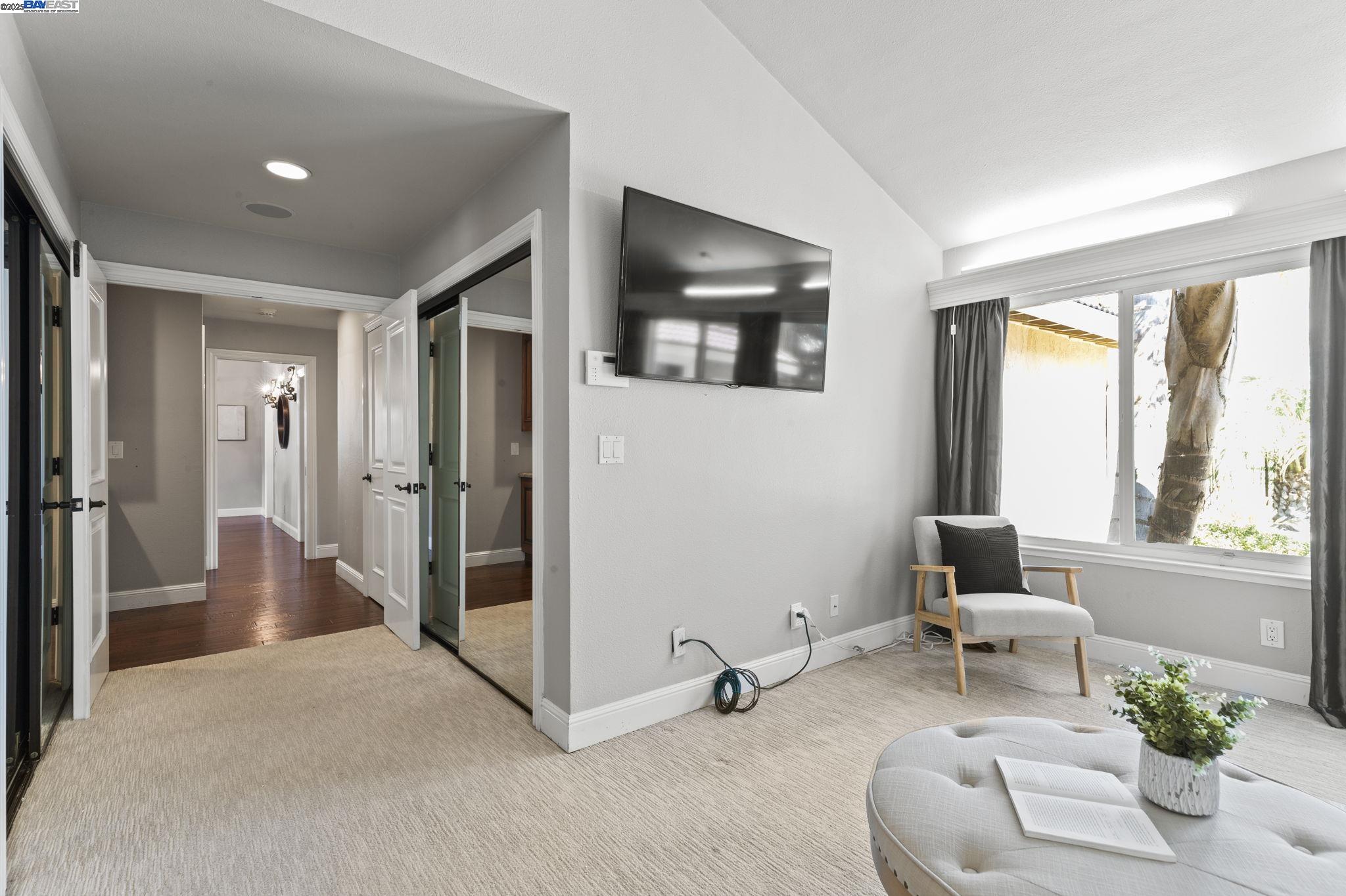 820 Pinehurst Place San Ramon, CA 94583 - Photo 24 of 54 a living room with furniture and a potted plant