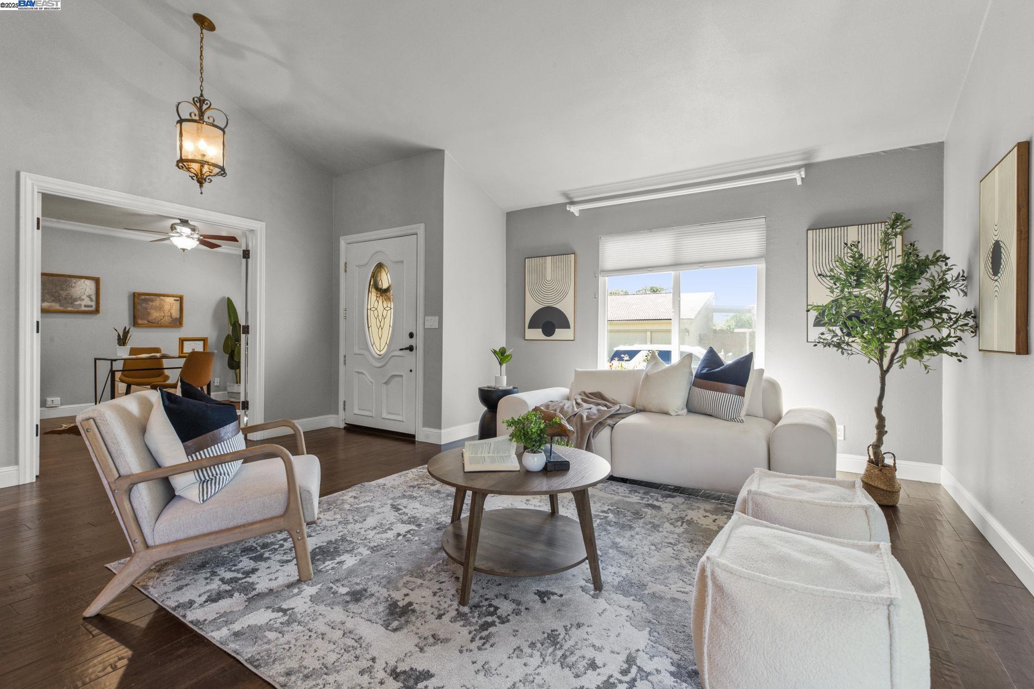 820 Pinehurst Place San Ramon, CA 94583 - Photo 3 of 54 a living room with furniture and a potted plant
