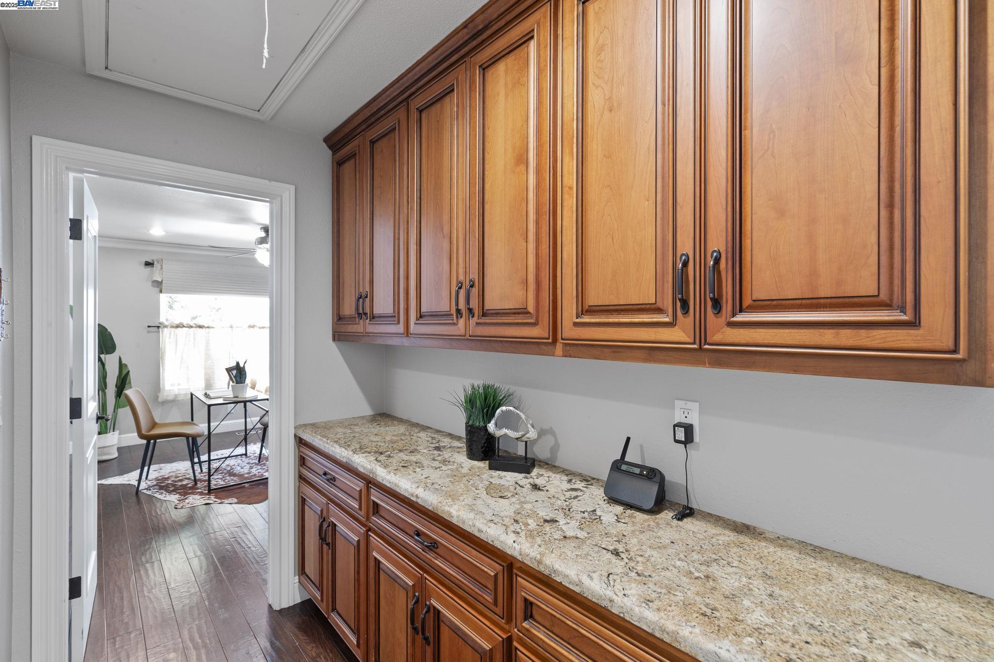 820 Pinehurst Place San Ramon, CA 94583 - Photo 31 of 54 a kitchen with stainless steel appliances granite countertop a sink a stove and cabinets