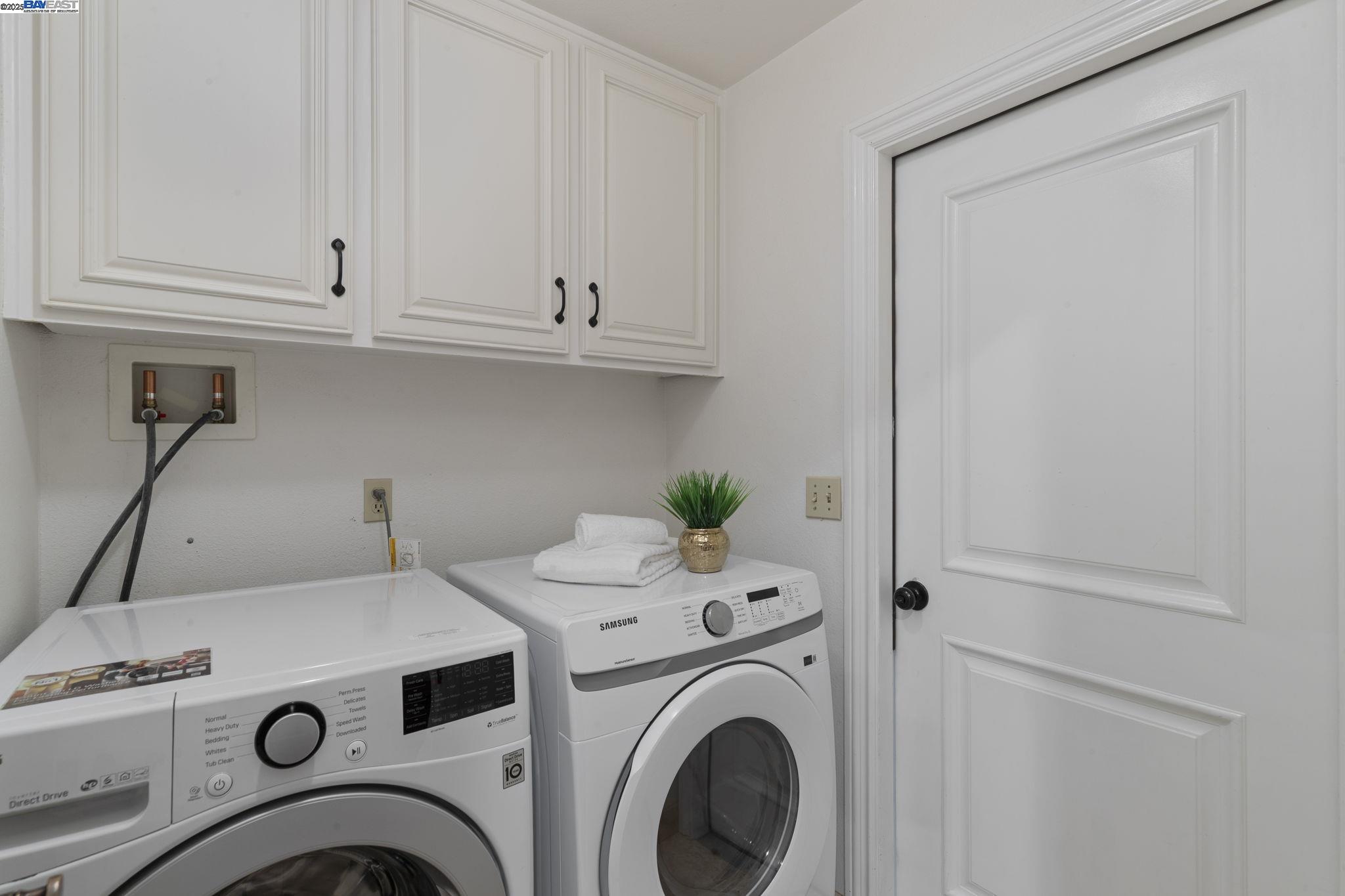 820 Pinehurst Place San Ramon, CA 94583 - Photo 32 of 54 a utility room with dryer and washer