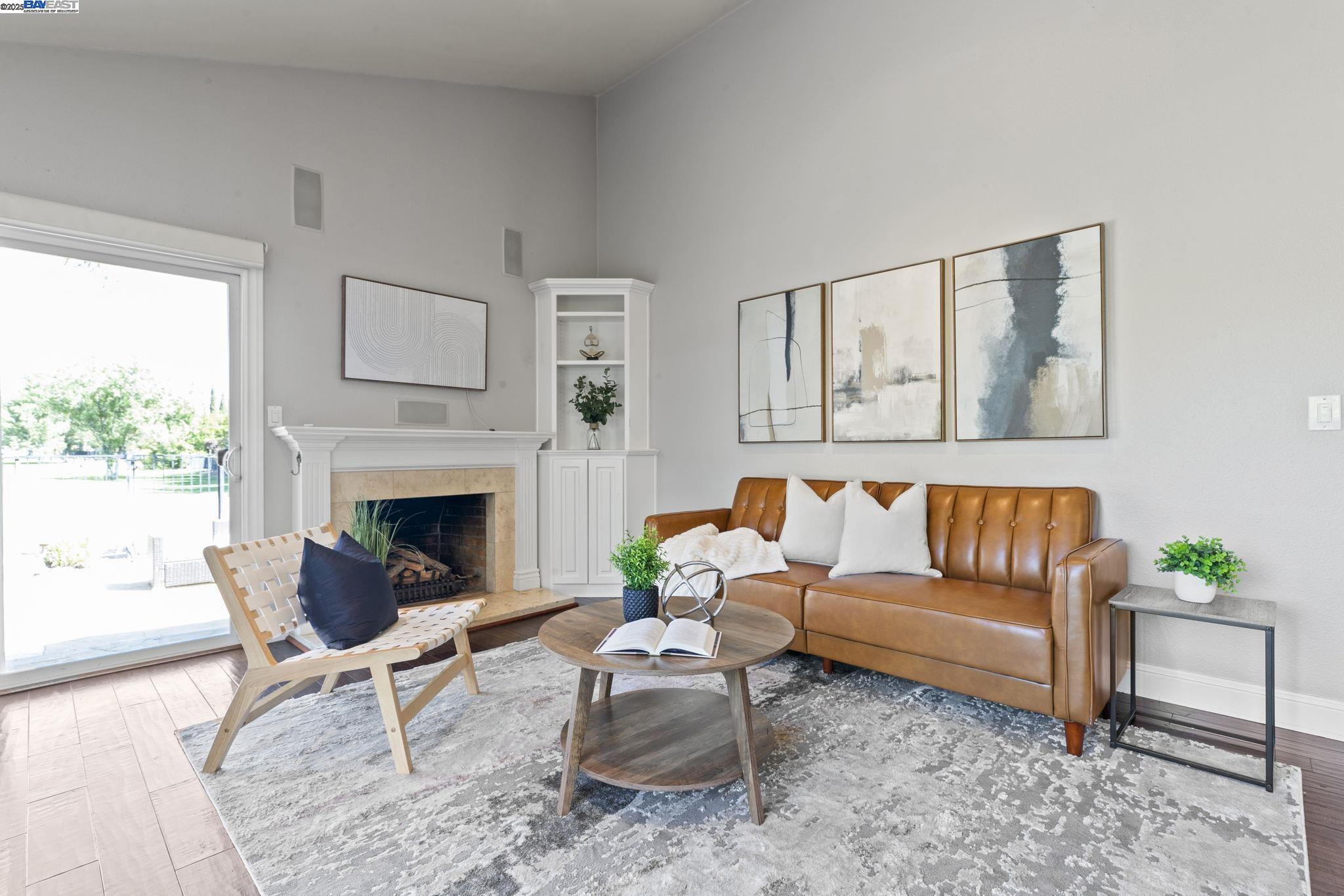 820 Pinehurst Place San Ramon, CA 94583 - Photo 9 of 54 a living room with furniture and a fireplace